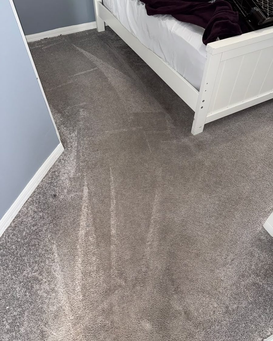 The same bedroom carpet after professional cleaning and extraction